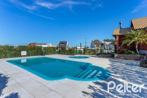 Casa em Condomínio à venda com 266m², 3 dormitórios, 3 suítes, 2 vagas, no bairro Hipica em PORTO ALEGRE