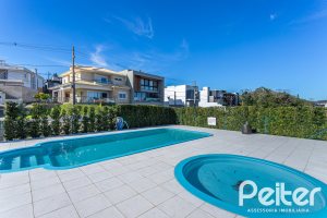 Casa em Condomínio à venda com 266m², 3 dormitórios, 3 suítes, 2 vagas, no bairro Hipica em PORTO ALEGRE