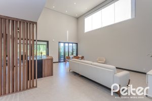 Casa em Condomínio à venda com 345m², 4 dormitórios, 4 suítes, 4 vagas, no bairro Alphaville em PORTO ALEGRE