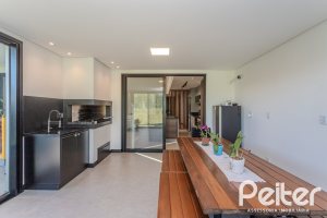 Casa em Condomínio à venda com 345m², 4 dormitórios, 4 suítes, 4 vagas, no bairro Alphaville em PORTO ALEGRE