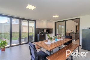 Casa em Condomínio à venda com 345m², 4 dormitórios, 4 suítes, 4 vagas, no bairro Alphaville em PORTO ALEGRE