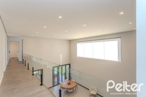 Casa em Condomínio à venda com 345m², 4 dormitórios, 4 suítes, 4 vagas, no bairro Alphaville em PORTO ALEGRE