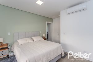 Casa em Condomínio à venda com 345m², 4 dormitórios, 4 suítes, 4 vagas, no bairro Alphaville em PORTO ALEGRE
