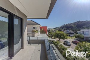 Casa em Condomínio à venda com 345m², 4 dormitórios, 4 suítes, 4 vagas, no bairro Alphaville em PORTO ALEGRE