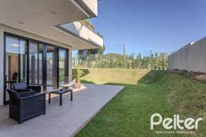 Casa em Condomínio à venda com 345m², 4 dormitórios, 4 suítes, 4 vagas, no bairro Alphaville em PORTO ALEGRE