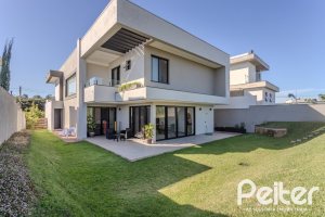 Casa em Condomínio à venda com 345m², 4 dormitórios, 4 suítes, 4 vagas, no bairro Alphaville em PORTO ALEGRE