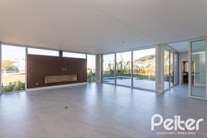 Casa em Condomínio à venda com 400m², 3 dormitórios, 3 suítes, 4 vagas, no bairro Alphaville em PORTO ALEGRE