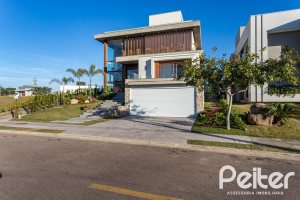 Casa em Condomínio à venda com 400m², 3 dormitórios, 3 suítes, 4 vagas, no bairro Alphaville em PORTO ALEGRE