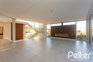 Casa em Condomínio à venda com 400m², 3 dormitórios, 3 suítes, 4 vagas, no bairro Alphaville em PORTO ALEGRE