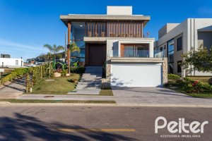 Casa em Condomínio à venda com 400m², 3 dormitórios, 3 suítes, 4 vagas, no bairro Alphaville em PORTO ALEGRE