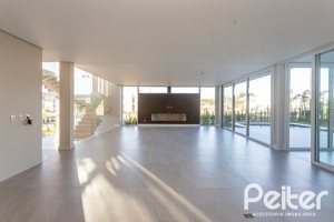 Casa em Condomínio à venda com 400m², 3 dormitórios, 3 suítes, 4 vagas, no bairro Alphaville em PORTO ALEGRE
