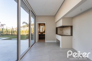 Casa em Condomínio à venda com 400m², 3 dormitórios, 3 suítes, 4 vagas, no bairro Alphaville em PORTO ALEGRE