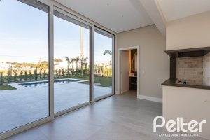 Casa em Condomínio à venda com 400m², 3 dormitórios, 3 suítes, 4 vagas, no bairro Alphaville em PORTO ALEGRE