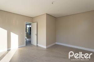 Casa em Condomínio à venda com 400m², 3 dormitórios, 3 suítes, 4 vagas, no bairro Alphaville em PORTO ALEGRE