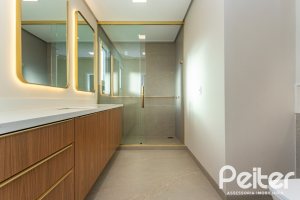 Casa em Condomínio à venda com 400m², 3 dormitórios, 3 suítes, 4 vagas, no bairro Alphaville em PORTO ALEGRE