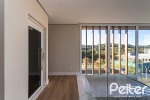 Casa em Condomínio à venda com 400m², 3 dormitórios, 3 suítes, 4 vagas, no bairro Alphaville em PORTO ALEGRE