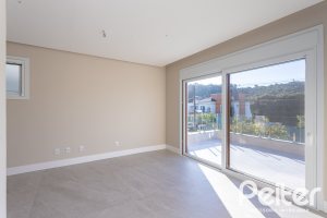 Casa em Condomínio à venda com 400m², 3 dormitórios, 3 suítes, 4 vagas, no bairro Alphaville em PORTO ALEGRE