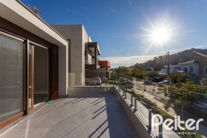 Casa em Condomínio à venda com 400m², 3 dormitórios, 3 suítes, 4 vagas, no bairro Alphaville em PORTO ALEGRE