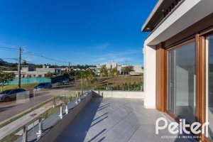 Casa em Condomínio à venda com 400m², 3 dormitórios, 3 suítes, 4 vagas, no bairro Alphaville em PORTO ALEGRE