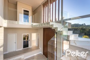 Casa em Condomínio à venda com 400m², 3 dormitórios, 3 suítes, 4 vagas, no bairro Alphaville em PORTO ALEGRE