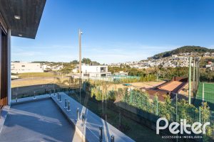 Casa em Condomínio à venda com 400m², 3 dormitórios, 3 suítes, 4 vagas, no bairro Alphaville em PORTO ALEGRE