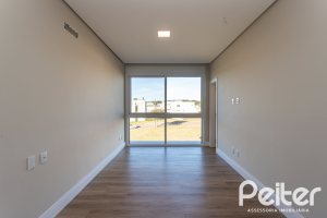 Casa em Condomínio à venda com 400m², 3 dormitórios, 3 suítes, 4 vagas, no bairro Alphaville em PORTO ALEGRE