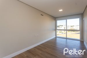 Casa em Condomínio à venda com 400m², 3 dormitórios, 3 suítes, 4 vagas, no bairro Alphaville em PORTO ALEGRE
