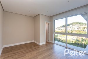 Casa em Condomínio à venda com 400m², 3 dormitórios, 3 suítes, 4 vagas, no bairro Alphaville em PORTO ALEGRE