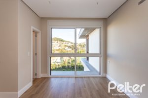 Casa em Condomínio à venda com 400m², 3 dormitórios, 3 suítes, 4 vagas, no bairro Alphaville em PORTO ALEGRE