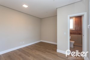 Casa em Condomínio à venda com 400m², 3 dormitórios, 3 suítes, 4 vagas, no bairro Alphaville em PORTO ALEGRE