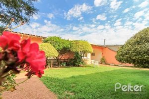 Casa à venda com 312m², 3 dormitórios, 2 suítes, 2 vagas, no bairro Ipanema em Porto Alegre