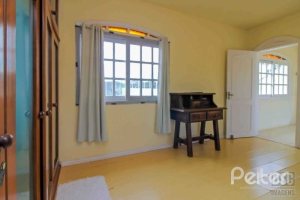 Casa à venda com 312m², 3 dormitórios, 2 suítes, 2 vagas, no bairro Ipanema em Porto Alegre