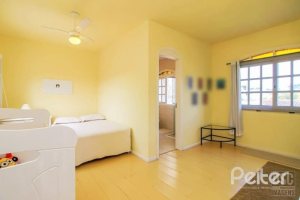 Casa à venda com 312m², 3 dormitórios, 2 suítes, 2 vagas, no bairro Ipanema em Porto Alegre