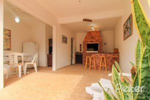 Casa à venda com 312m², 3 dormitórios, 2 suítes, 2 vagas, no bairro Ipanema em Porto Alegre