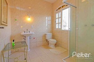 Casa à venda com 312m², 3 dormitórios, 2 suítes, 2 vagas, no bairro Ipanema em Porto Alegre