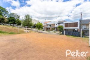 Casa em Condomínio à venda com 190m², 3 dormitórios, 1 suíte, 2 vagas, no bairro Vila Nova em PORTO ALEGRE