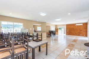 Casa em Condomínio à venda com 190m², 3 dormitórios, 1 suíte, 2 vagas, no bairro Vila Nova em PORTO ALEGRE