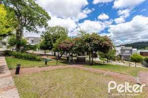 Casa em Condomínio à venda com 190m², 3 dormitórios, 1 suíte, 2 vagas, no bairro Vila Nova em PORTO ALEGRE