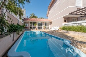 Casa em Condomínio à venda com 162m², 3 dormitórios, 1 suíte, 2 vagas, no bairro Vila Assunção em PORTO ALEGRE