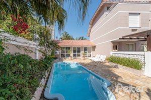 Casa em Condomínio à venda com 162m², 3 dormitórios, 1 suíte, 2 vagas, no bairro Vila Assunção em PORTO ALEGRE