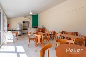Casa em Condomínio à venda com 162m², 3 dormitórios, 1 suíte, 2 vagas, no bairro Vila Assunção em PORTO ALEGRE