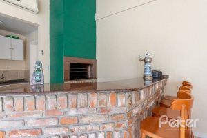 Casa em Condomínio à venda com 162m², 3 dormitórios, 1 suíte, 2 vagas, no bairro Vila Assunção em PORTO ALEGRE