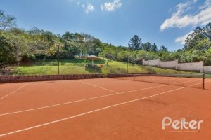 Casa em Condomínio à venda com 242m², 3 dormitórios, 3 suítes, 4 vagas, no bairro Mountain Ville em PORTO ALEGRE