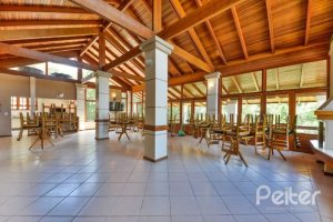 Casa em Condomínio à venda com 242m², 3 dormitórios, 3 suítes, 4 vagas, no bairro Mountain Ville em PORTO ALEGRE