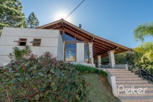 Casa em Condomínio à venda com 242m², 3 dormitórios, 3 suítes, 4 vagas, no bairro Mountain Ville em PORTO ALEGRE