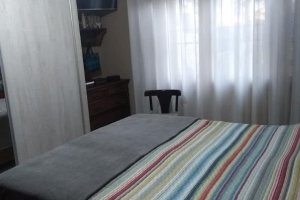 Casa à venda com 107m², 3 dormitórios, 1 suíte, 3 vagas, no bairro Guarujá em Porto Alegre