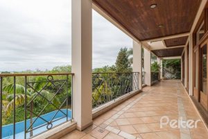 Casa à venda com 1107m², 4 dormitórios, 4 suítes, 8 vagas, no bairro Vila Assunção em Porto Alegre