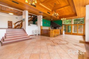 Casa à venda com 1107m², 4 dormitórios, 4 suítes, 8 vagas, no bairro Vila Assunção em Porto Alegre