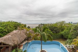 Casa à venda com 1107m², 4 dormitórios, 4 suítes, 8 vagas, no bairro Vila Assunção em Porto Alegre