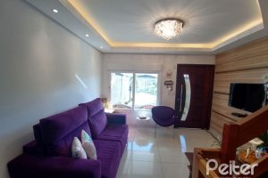 Casa à venda com 118m², 3 dormitórios, 1 suíte, 2 vagas, no bairro Hípica em Porto Alegre